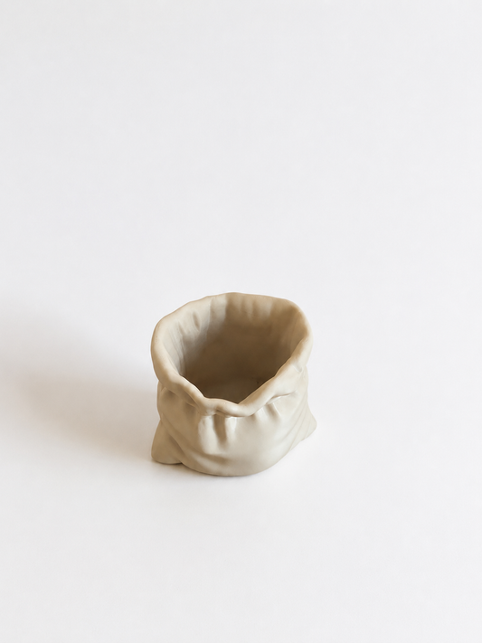 Vista dall’alto del vaso a sacco in PETG stampato in 3D con bordo irregolare