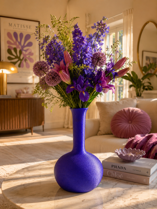Antica Caverna decorative designer vase with elegant floral arrangement in a luxury modern living room