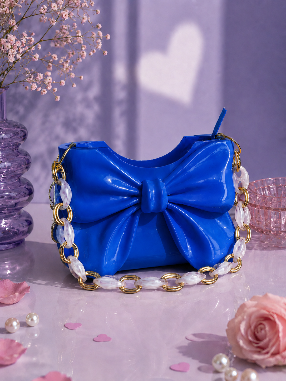 Elegant blue Dany bow handbag designed in 3D and crafted from high-quality PLA with a glossy finish. Luxury women's designer shoulder bag featuring a sculptural bow, perfect for modern fashion, elegant outfits, parties, weddings, special occasions and everyday style. A unique contemporary fashion accessory and premium gift for her.