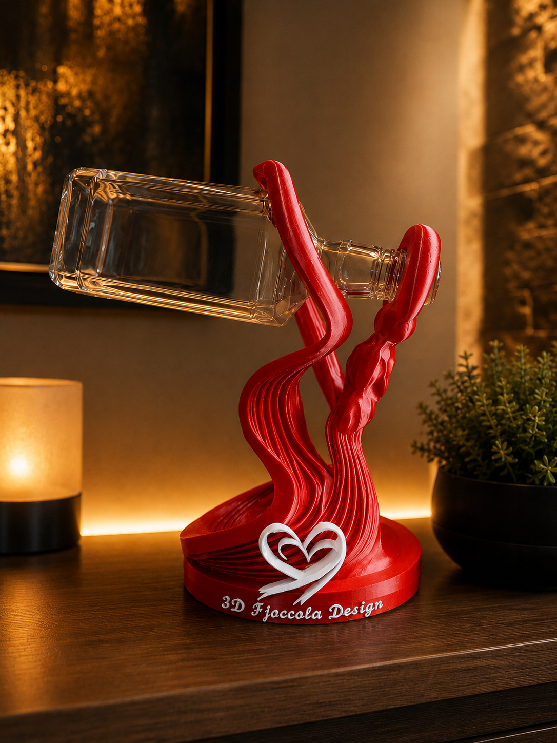 Gravity™ Red is a luxury floating wine bottle holder professionally designed in 3D and precision 3D printed using premium PETG. Featuring a bold red finish with a white heart detail, this modern sculptural bottle holder creates an elegant floating effect, making it perfect for home decor, kitchens, dining rooms, wine displays and stylish home bars. Designed and Made in Italy by FJoccola Design.