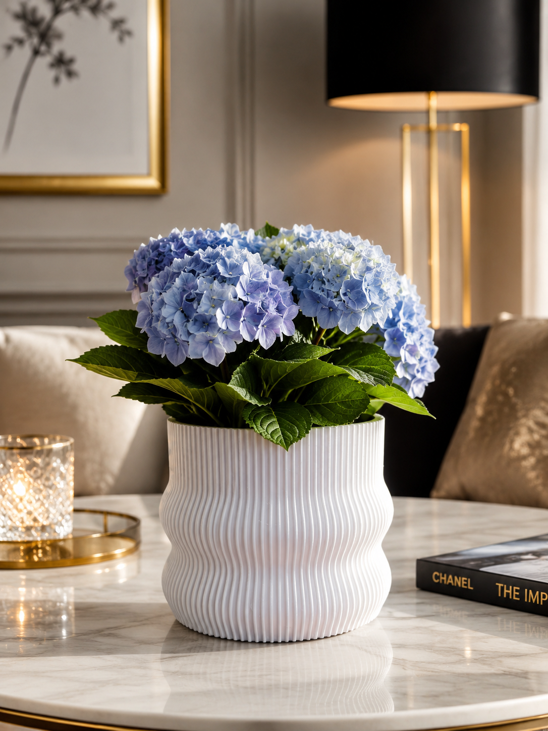 Luxury white 3D printed planter crafted in premium PETG with beautiful blue hydrangeas. Elegant modern flower pot for contemporary home decor, living room decoration, office styling and minimalist interior design. Made in Italy.