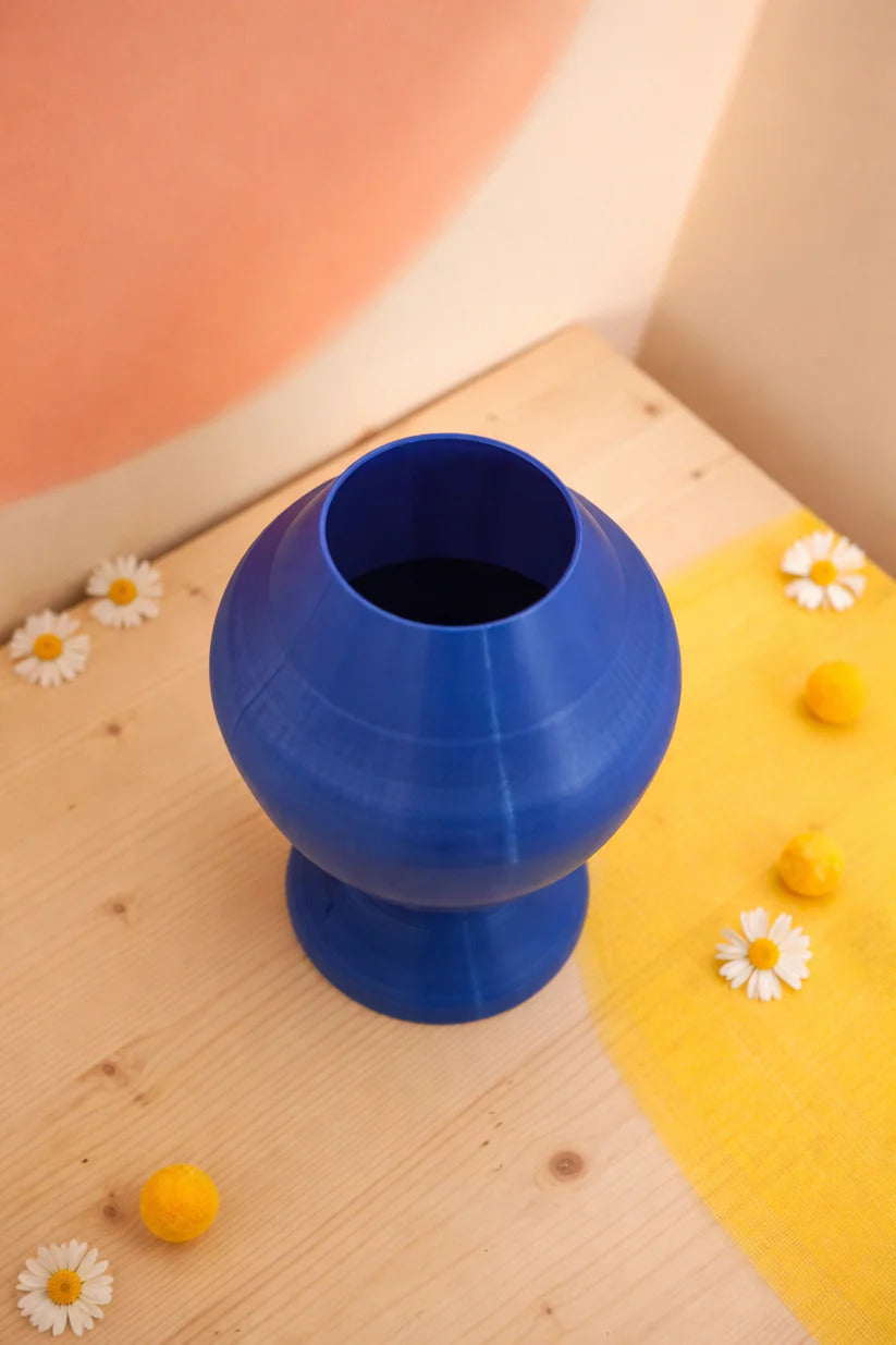 Modern blue flower vase made with 3D printing technology, decorative home accessory, designer vase for stylish interiors.