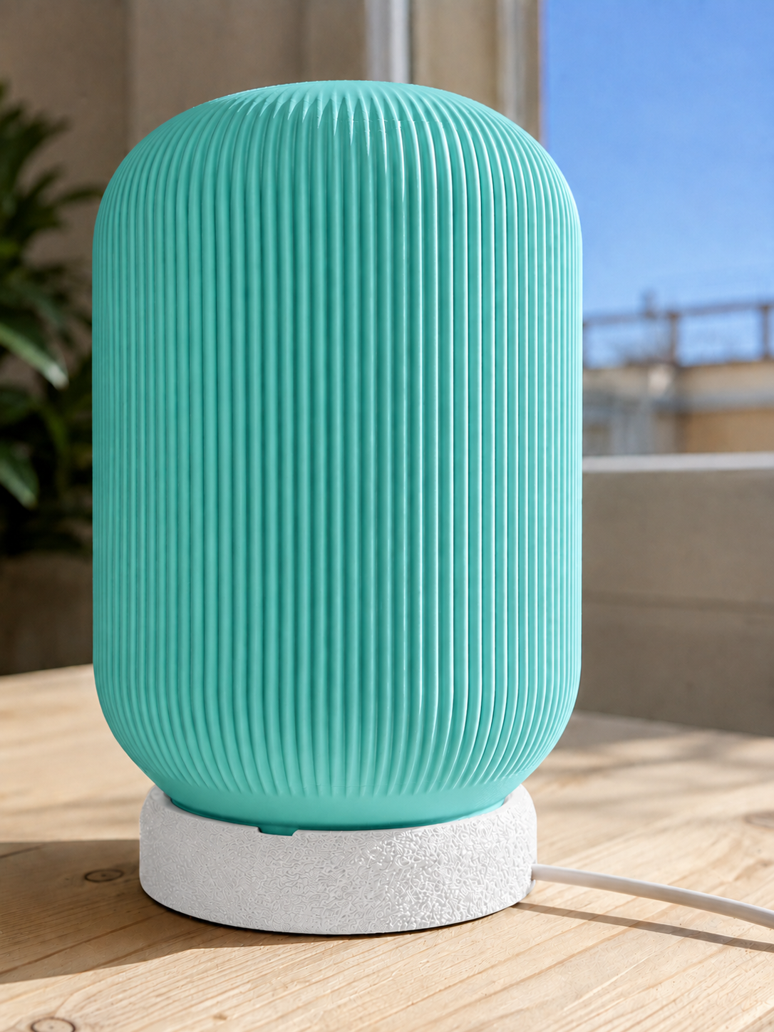 Modern 3D printed table lamp with a turquoise ribbed shade and textured white base, featuring a contemporary minimalist design for bedrooms, bedside tables, living rooms and modern home decor.