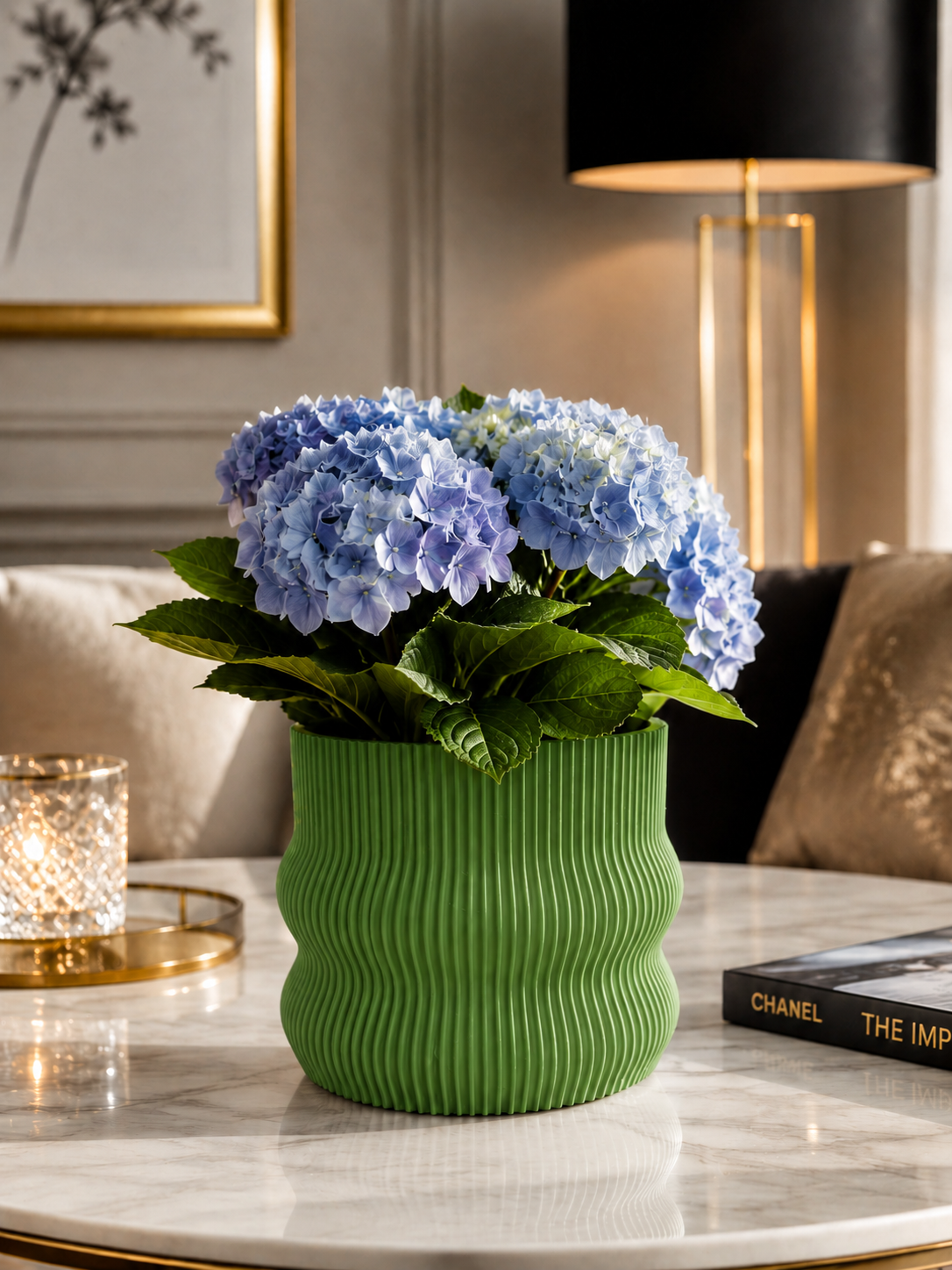Elegant green 3D printed planter crafted from premium PETG with a refined ribbed design. Decorative indoor plant pot featuring beautiful blue hydrangeas, ideal for luxury home décor, modern living rooms, Scandinavian interiors, contemporary office styling, designer spaces and minimalist home decoration. Expertly designed and proudly made in Italy.