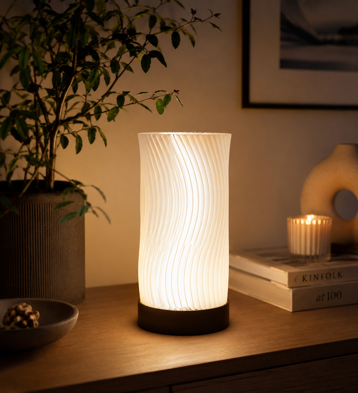 White Ocean Waves 3D printed LED table lamp with sculptural wave design and warm ambient light in a modern interior.