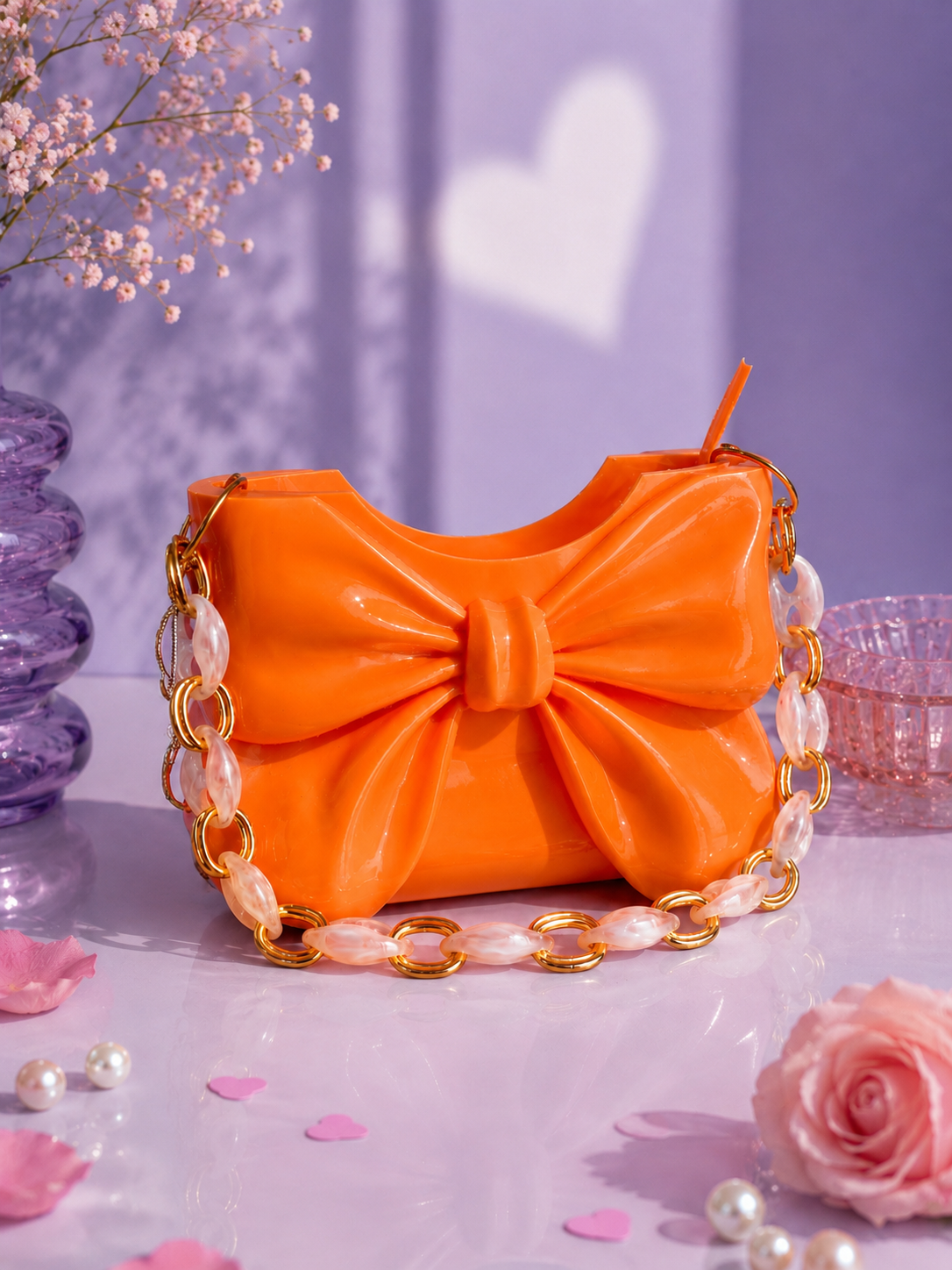 Elegant orange Dany bow handbag designed in 3D and crafted from high-quality PLA with a glossy finish. Luxury women's designer shoulder bag featuring a sculptural bow, perfect for modern fashion, autumn outfits, casual chic looks, parties, special occasions and everyday style. A unique contemporary fashion accessory and premium gift for her.