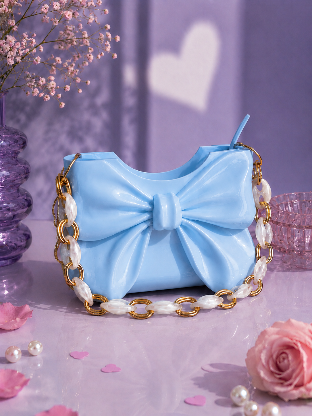 Elegant sky blue Dany bow handbag designed in 3D and crafted from high-quality PLA with a glossy finish. Luxury women's designer shoulder bag featuring a sculptural bow, perfect for spring and summer fashion, elegant outfits, weddings, parties, special occasions and everyday style. A unique contemporary fashion accessory, statement handbag and premium gift for her.