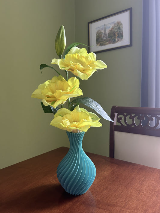 Vaso Bomboniera decorativo stampato in 3D in PLA, design a spirale, vista frontale con fiori