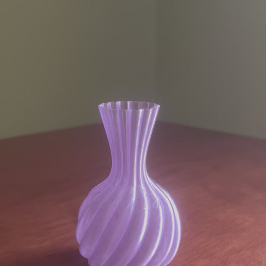Elegant purple designer vase with vibrant flowers, modern home decoration, luxury interior decor, decorative flower arrangement and premium living room accessory.