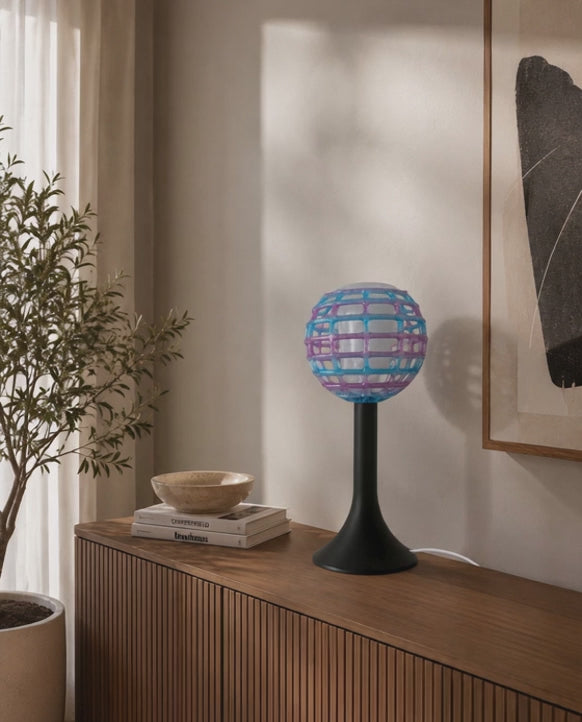 Discover Rekindled Light, a modern 3D printed designer table lamp crafted in PETG with a distinctive geometric sphere design and E27 socket. A sculptural decorative light created to enhance contemporary living rooms, bedrooms and stylish modern interiors.