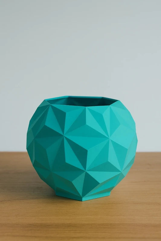 Vaso geometrico rotondo verde stampato in 3D 